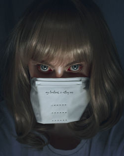 Close-up portrait of woman with eyes closed