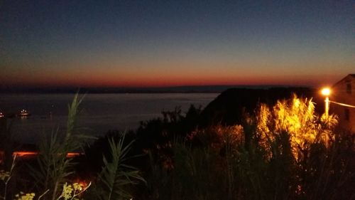 Scenic view of sea at sunset