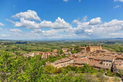 Scenic view of town against sky