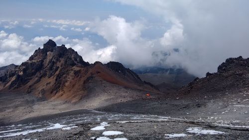 Pico de orizaba against cloudy sky
