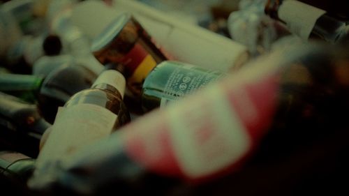 Cropped hand of person holding pills