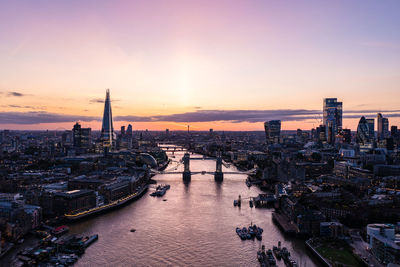 High angle view of city buildings during sunset