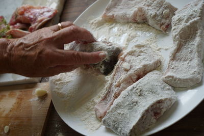 Close-up of person preparing food