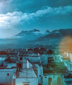 High angle view of townscape against sky at dusk