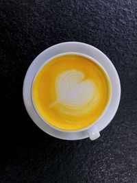 High angle view of coffee cup on table