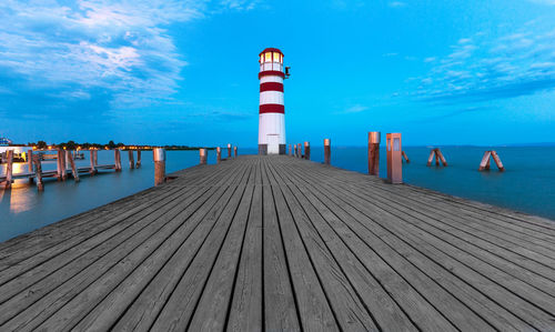 Pier over sea against sky