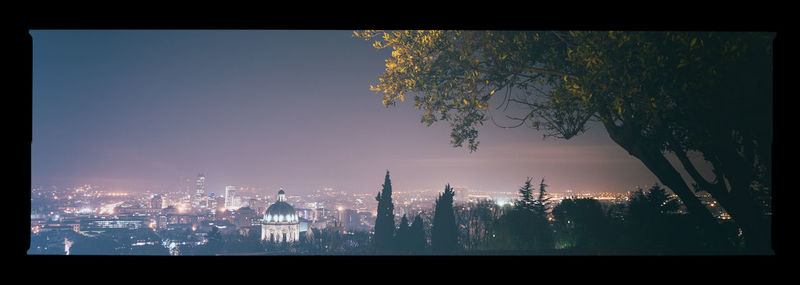 Cityscape against sky during sunset