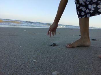 Low section of man on beach