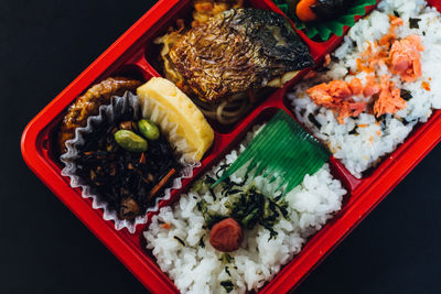 Directly above shot of various food in lunch box