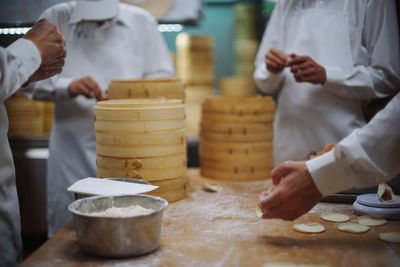 People working in kitchen