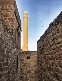 Low angle view of historical building against sky