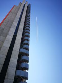 Low angle view of building against clear blue sky