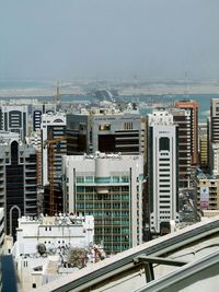 High angle view of buildings against sky in city