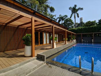 View of swimming pool against blue sky