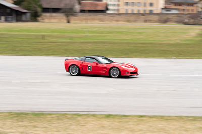Ambri, ticino, switzerland, april 3, 2022 car test racing along the runway on the local airfield