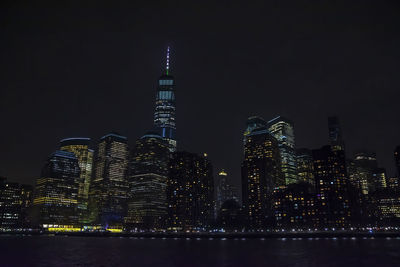 Illuminated buildings in city at night