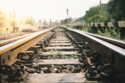 Surface level of railroad tracks against sky