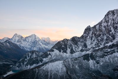 Scenic view of mountains against sky during winter