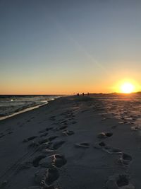 Scenic view of beach during sunset