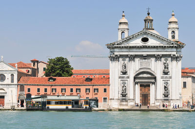 View of buildings against sky in city