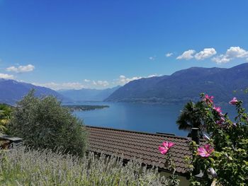 Scenic view of lake against cloudy sky