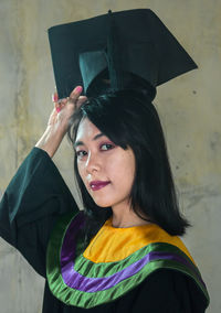 Portrait of beautiful woman wearing hat