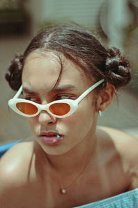 Close-up girl wearing swimming goggles