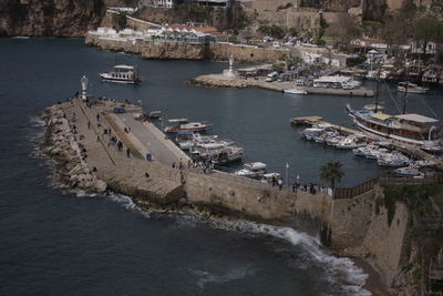 High angle view of boats moored at harbor