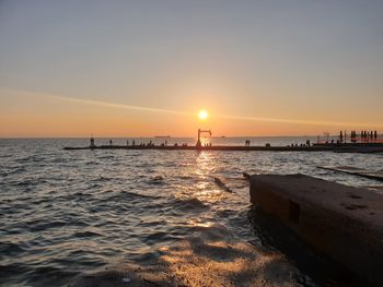 Scenic view of sea against sky during sunset