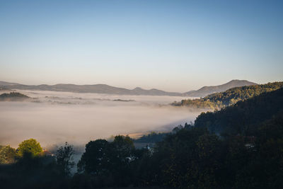 Scenic view of mountains against clear sky