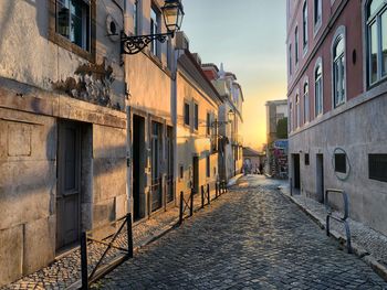 Narrow alley amidst buildings in city