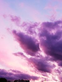 Low angle view of dramatic sky during sunset