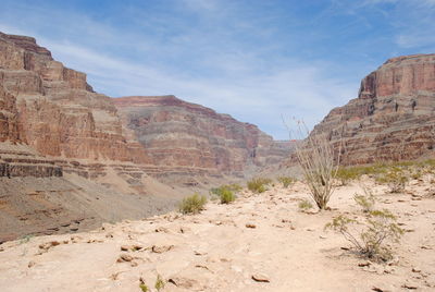 Scenic view of rocky mountains against sky