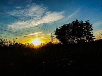 Scenic view of landscape at sunset