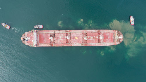 High angle view of boat floating on sea