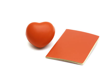 Close-up of heart shape over white background