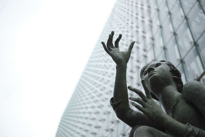 Low angle view of statue against clear sky