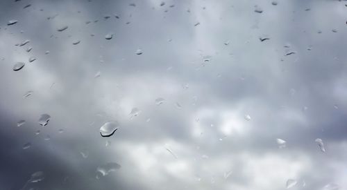Full frame shot of water drops against sky
