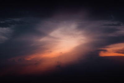 Low angle view of cloudy sky during sunset