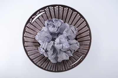 High angle view of wicker basket on table