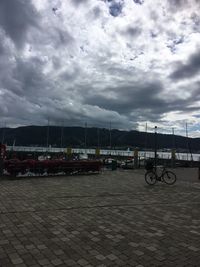 City street against cloudy sky