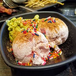 Close-up of ice cream served in plate on table