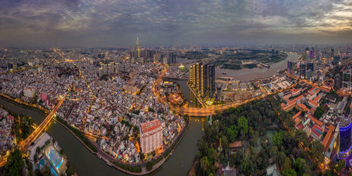 High angle view of city buildings against sky