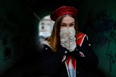 French clothing style, street fashion. a beautiful girl in a coat, red beret.