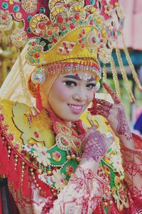 Portrait of young woman wearing traditional costume