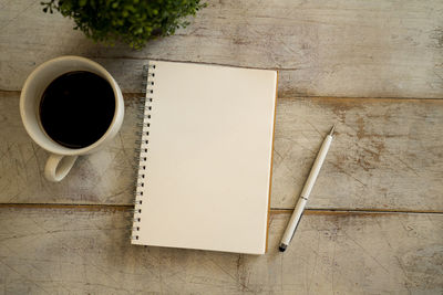 High angle view of coffee cup on table