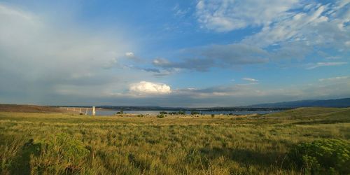 Scenic view of field against sky