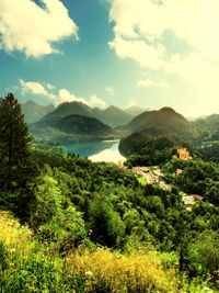 Scenic view of mountains against cloudy sky