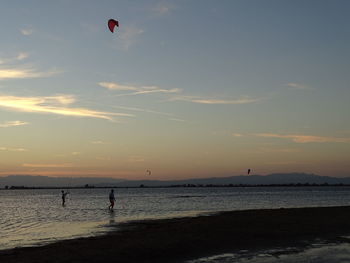 Scenic view of sea against sky at sunset