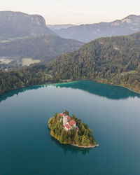 Aerial view of cerkev marijinega, a catholic church on a small island in the middle of bled lake 